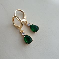 Emerald Green & Crystal Teardrop Teardrop Jewel Huggie Hoop Earrings, 14k Gold Plated Earrings, Vintage Style Earrings, Victorian Earrings  Product specifications: * Material: 14K Gold Plated Brass * Size Each charm measures 1.35 cm x 0.6cm Earring Options: * 8mm inner diameter hoops * 10mm inner diameter hoops Packaging and Gifts: * All pieces of jewellery are set on a card in a mesh jewellery pouch  Shipping: * All Australian orders will be shipped out within 1 - 3 days by standard untracked l Emerald Green Crystal, Victorian Earrings, Jewellery Pouch, Vintage Style Earrings, Green Crystal, Huggie Hoop Earrings, Earrings Vintage, Style Earrings, Gold Plated Earrings