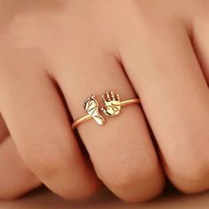 Material:  18K solid gold, Au750 stamped Ring band width: 1.1mm approx  Custom made process:  1. Measure your finger size accurately and precisely.  2. Place the order and leave us a note at checkout of your finger size. 2. Send us high resolution photos of your baby's footprint and handprint. 3. We will provide mockup for your review before send off for production. -------------Shipping--------------------- We ship all our jewellery from London,  UK.  We aim to dispatch your jewellery within 3- Gold Coin Jewelry, New Mum Gift, Gold Finger Rings, Stamped Ring, Stamped Rings, Baby Footprints, Gift For Mum, Finger Rings, Coin Jewelry