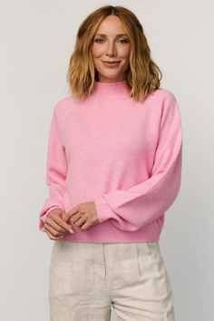 Perfect for running errands or lunch with friends Soft, lightweight knit material with great stretch Slightly heathered pink color Mock turtleneck style Raglan cut sleeve Wide, puffed sleeve Loose, relaxed fit Ribbed cuff, neck, and hemline Self: 90% Polyester, 5% Elastene, 5% Wool Marianne is 5'6, cup size 34D, size 6 and wearing size S Casual Pink High Neck Sweater, Lunch With Friends, Turtleneck Style, Mock Turtleneck, Mock Neck Sweater, Cup Size, Lightweight Knit, Knitting Materials, Pink Sweater