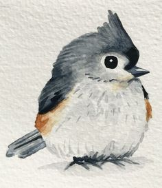 a watercolor painting of a bird on white paper