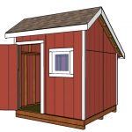 a small red shed with the door open and windows on it's side, in front of a white background