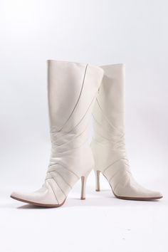 FREE SHIPPING ON ORDERS OVER $35 TO THE USA!  Incredible vintage white boots! Love them! They are size 5 1/2 in great, very gently used shape! Very tall heels! IMPORTANT INFO BELOW (Please Read Before Sending a Convo) - Measurements: For clothing, we state the measurements in the listing description. For jewerly and other accessories, we try to include a ruler in each photo to show the measurement (in inches) for each item. If you can't find the measurements in the title, photos or description, White Fitted Mid-calf Boots With Round Toe, White Leather Fitted Mid-calf Boots, Fitted White Leather Mid-calf Boots, White Fitted Mid-calf High Ankle Boots, Fitted White Heeled Boots With Almond Toe, White Fitted Mid-calf Boots With Snip Toe, White Fitted High Ankle Heeled Boots, Fitted High Ankle White Heeled Boots, Fitted White High Ankle Heeled Boots