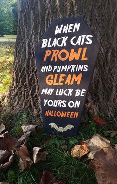 a sign that says when black cats prowl and pumpkins glam my luck be yours on halloween