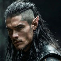 a man with long hair and piercings on his ears