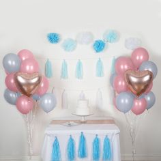 some balloons and tassels are on the table