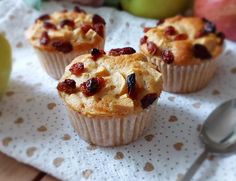 three muffins sitting on top of a white paper towel