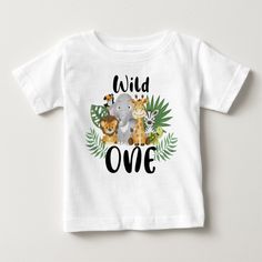 a baby t - shirt with the words wild one on it and jungle animals around it