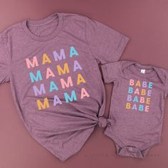 IMPORTANT NOTE: All Little Mama shirts are unisex sizing. That means they run slightly larger than typical women's shirts and slightly smaller than typical men's shirts. We recommend ordering your normal size for a loose fit, or sizing down for a more fitted look. Women sometimes prefer to size down in unisex sizing. If in between two sizes, most people are happy with the smaller option. Please reference all size charts before purchasing. SHIPPING DETAILS: - All shirts are shipped via USPS First Matching Summer Cotton Tops, Summer Cotton Tops With Matching Style, Cute Purple Shirt With Graphic Print, Purple Printed Graphic Tee Tops, Purple Printed Graphic Tee, Unisex Name Print Shirt For Summer, Matching Letter Print Cotton Top, Matching Cotton Tops With Letter Print, Family Matching Printed Cotton Tops