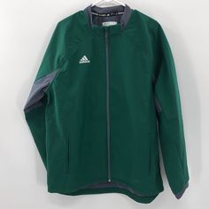 Adidas Long Sleeve Climaproof Full Zip Jacket Size: Large Color: Green And Grey Bust: 24in Length: 32 Arm: 33in New With No Tags C23 Green Long Sleeve Moisture-wicking Outerwear, Green Adidas Winter Track Jacket, Adidas Green Winter Track Jacket, Winter Adidas Green Track Jacket, Winter Green Moisture-wicking Windbreaker, Adidas Green Winter Windbreaker, Green Weatherproof Sports Outerwear, Green Waterproof Windbreaker For Cold Weather, Moisture-wicking Outerwear For Fall Winter Sports