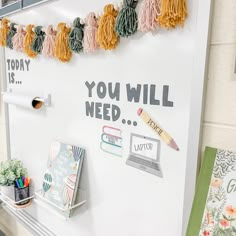 a white board with writing on it that says, you will need lots of tassels