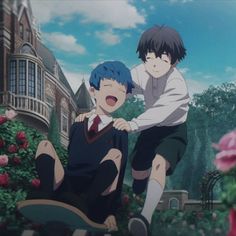 two anime characters sitting on the ground in front of flowers