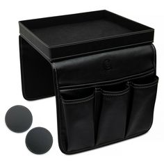 two black leather storage bins next to each other on a white background with three round buttons