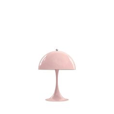 a pink table lamp on a white background