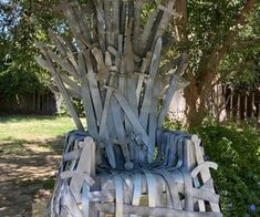 a game of throne sitting in the middle of a yard