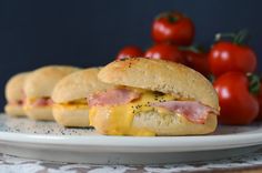 ham and cheese sandwich with tomatoes on the side