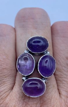 Large genuine amethyst Vintage ring Low content silver not sterling. Size 7  Can be resized by my jeweler for $20 All rings are shipped free in the US in a nice gift box.   Check out our over a THOUSAND great reviews Engraving is $4 per letter and is not always perfect depending on the piece. It can take a few days if the jeweler is busy. This is payable to Paypal Judithsltd@gmail.com Oval Purple Ring With Stones, Fine Jewelry Amethyst Ring Gift, Amethyst Cabochon Jewelry For Anniversary, Nickel-free Purple Amethyst Ring, Collectible Amethyst Gemstone Rings, Collectible Oval Amethyst Ring In Sterling Silver, Oval Silver Amethyst Ring Collectible, Unique Collectible Amethyst Ring, Collectible Silver Amethyst Rings