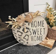 a wooden sign that says home sweet home