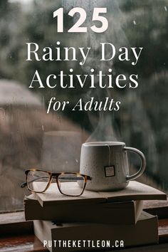 a coffee cup on top of a stack of books with the words, 12 rainy day activities for adults