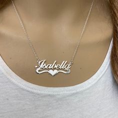 Description: 925 Sterling Silver Name Plate Heart Necklace - Isabella Item No.: C01 Metal Type: .925 Sterling Silver With Stamped 925 Finish: High Polish Measurement: 16" - 18 Inches. Pendant: 1.5" X 0.75" Brand New With Box Classic Sterling Silver Jewelry For Valentine's Day, Classic Sterling Silver Pendant Name Necklace, Silver Double Heart Name Necklace, Sterling Silver Hallmarked Nameplate Necklace, Classic Sterling Silver Heart Pendant Jewelry, Silver Elegant Double Heart Name Necklace, Personalized Silver Jewelry For Valentine's Day, Silver Heart Pendant Name Necklace For Personalized Gift, Silver Dainty Name Necklace As Gift For Her