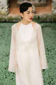 Elegant V-neck Dress With Embroidered Neckline, Elegant Tops For Spring Wedding, Spring Wedding Tops With Embroidered Neckline, Elegant Blouse With Band Neckline For Spring, Feminine Silk V-neck Wedding Dress, Long Sleeve Silk Wedding Dress For Spring, Elegant Spring Tops With Band Neck, Feminine V-neck Silk Wedding Dress, Spring Wedding Silk Dress With Long Sleeves