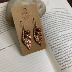 Gorgeous handmade copper leaves, perfect to wear while sipping pumpkin spiced coffee or reading Jane Eyre on the quad. Happy Fall! 🍂 Pumpkin Spiced Coffee, Easy Crafts To Sell, Autumn Earrings, Ears Pierced, Spiced Coffee, Jane Eyre, Fall Earrings, Falling Leaves, Handmade Wire Jewelry