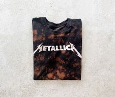 a t - shirt that says metallic on it