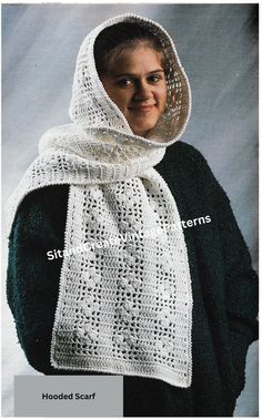 a woman wearing a white shawl and black sweater with the words hooded scarf on it