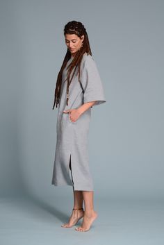 "🌿 ITEM DESCRIPTION Loose fit women's long dress with wide sleeves for summer vacation or casual wear. This dress made from washed linen in various colors. DETAILS: - Made-to-measure - Shift cut dress - Side slits - Deep side pockets - Wide half sleeves - Crew neckline - Mid-calf or custom length - 100% linen in a medium weight, washed and softened - Big color choice, color shown RAIN DROP 🌿 SIZING Petit, Regular, Plus Size - all our clothes are custom-made, we do all sizes. The model (5'9'', Long Tunic Dress, Long Linen Skirt, Linen Dress Summer, Natural Linen Dress, Womens Long Dresses, Viking Dress, Loose Maxi Dress, Long Linen Dress, Summer Linen Dresses