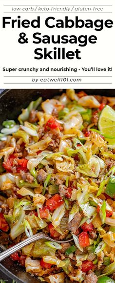 a skillet filled with fried cabbage and sausage