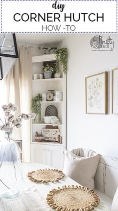 a white table topped with lots of pillows