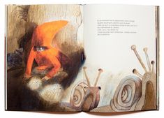 an open children's book with pictures of snails