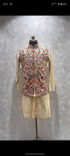 *3 Piece Cream :- Kurta , Pant, and Koti  *Fabric: %100  Cotton &  Silk  , Thick, Warm, Comfortable, Breathable, Softer, Satin Feeling *Center Hide Button with Hooks, With  Pants Stylish Pajama With Double Pocket *This Suit Has A 6" Drop Which Is The Difference Between The Size Of The Sherwani & Pants. For Example, A 40r Jacket Includes A 34W Pant *Dry Clean Only Important Note: All Our Products Are Made To Order ! Please Contact Us For Perfect Fitting Suit. .Full Lining Nehru Jacket With Kurta Traditional Chikankari Embroidery Sets For Winter, Traditional Winter Sets With Chikankari Embroidery, Embroidered Multicolor Winter Sets, Traditional Winter Sets With Intricate Embroidery, Traditional Embroidered Outerwear For Diwali, Traditional Embroidered Set With Stand Collar, Traditional Sets With Intricate Embroidery And Stand Collar, Traditional Set With Intricate Embroidery And Stand Collar, Traditional Cotton Sherwani For Winter