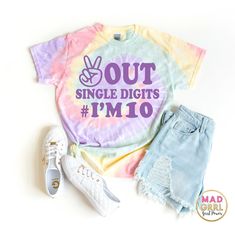 two pairs of shoes and a tee shirt with the words double digits on it