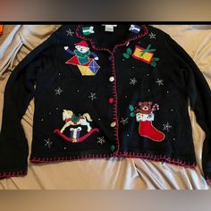 Vintage Ugly Christmas Cardigan Sweater Size Large. Beautiful Stitching. It Was Bought , But Never Worn. It Does Have Shoulder Pads That Could Be Taken Out As Well As Pictured In The Last Picture. There Is A A Minor Factory Defect On The Bear In The Box. It Would Be Excellent For The Holidays . Smoke-Free , Pet Free Home. Same Day Shipping. I Would Be Happy To Bundle With Other Items. Just Ask :). Fast Shipping Same Day. Black Holiday Sweater For Winter, Fitted Long Sleeve Christmas Sweater, Holiday Black Long Sleeve Sweater, Long Sleeve Christmas Cardigan, Festive Long Sleeve Christmas Cardigan, Fitted Christmas Sweater For Holiday, Fitted Christmas Holiday Sweater, Fitted Winter Cardigan For Festive Occasions, Festive Black Winter Outerwear