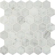 a white marble hexagonal tile pattern