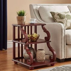 a living room scene with focus on the sofa and coffee table in the centerpiece