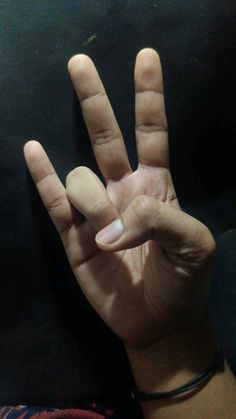 a person making the vulcan sign with their hand