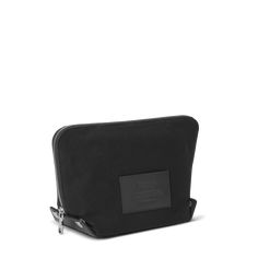 The Large Fold Out Cosmetic Case features a unique zip around closure with snaps that allows you to lay the case completely flat for a bird’s eye view of all your essentials, from cosmetics to toiletries. | Shinola Women's Large Fold Out Cosmetic Case in Black Canvas Compact Black Cosmetic Bag For Everyday Use, Compact Black Cosmetic Bag, Compact Travel Pouch With Zipper Closure, Black Leather Travel Cosmetic Bag, Black Travel Wallet With Snap Closure, Black Travel Wallets With Snap Closure, Modern Leather Cosmetic Bag With Zipper Closure, Modern Coin Purse With Removable Pouch For Travel, Classic Compact Bag With Zipper Closure