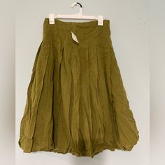 This Is A Pleated Midi Skirt From H&M It’s A Size (8) It’s Olive, It’s Nwt This Skirt Has A Zipper On The Back. If You Have Any Questions Please Comment Below!! Psa: This Is A Smoke Free Environment!!! Casual Green Pleated Full Skirt, Pleated Green Full Skirt, H&m Pleated Skirt For Spring, H&m Lined Skirt For Spring, H&m Spring Lined Skirt, Green Relaxed Fit Knee-length Skirt, Green Pleated Knee-length Bottoms, Spring H&m Lined Skirt Bottoms, H&m Spring Lined Skirt Bottoms