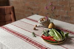 Heavy linen tablecloth, French Style Striped Table Cloth, Farmhouse tablecloth, Vintage red striped table cloth Handmade tablecloth. Elegant rustic look, unique heavy linen yarn texture, French style stripes pattern, natural and durable fabric. This rectangular tablecloth is the one, that will add to your table exceptional taste.      Available stripes patterns: - Burgundy red stripes - Dark green stripes - Black stripes.  Background - natural flax shade, not dyed linen - beige gray/ light gray.  Tablecloth is finished with simple double hem.  Fabric - 100 % linen. Certified according to OEKO-TEX® standard - free of harmful chemicals and is safe for everyday use and friendly for your family and the environment. We use only 100% European highest quality pure linen. This tablecloth is rewash Striped Table Cloth, Farmhouse Tablecloth, Yarn Texture, Farmhouse Tablecloths, Stripes Background, Rectangular Tablecloth, Handmade Tablecloth, Italian Table, Style Français