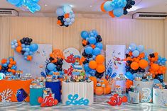 an ocean themed birthday party with balloons and decorations