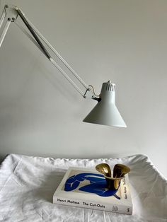 a lamp that is on top of a book