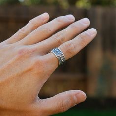 "This is a new style adjustable sterling silver ring features Buddhist Prayer \"Om Mani Padme Hum\" in Tibetan characters on the outside. The embossed Powerful Six Symbols in Tibetan Buddhism are: 唵（om）、嘛（ma）、呢（ni）、叭（pad）、咪（me）、吽（hum）. This simply elegant Buddhist Prayers Ring reminds us the key philosophy of Buddhism - All is Void. Humans often get loss in life while putting too much effort on judging others or complaining the surroundings, without realizing the world is just the reflection of Buddhist Prayers, Prayer Ring, Buddhist Prayer, Om Mani Padme Hum, Judging Others, Om Symbol, Meditation Rings, Male Hands, Ring Mens