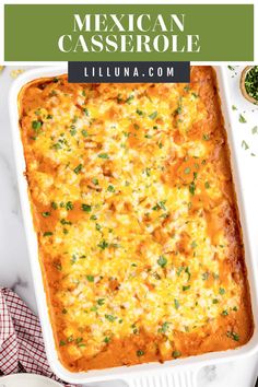 mexican casserole in a white dish on a marble countertop with text overlay