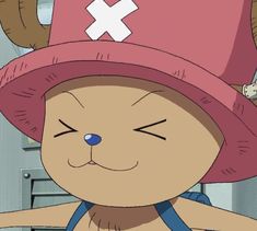 a cartoon character wearing a pink hat with an x on it's face and eyes