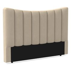 an upholstered headboard with black piping on the top and bottom panel