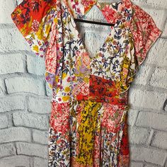 Open Back V-Neckline Pretty Floral Mini Dress Size L Nwot Measurements: Length 31”, Armpit To Armpit 19” Gold Romper, Floral Patchwork V-neck Dress For Summer, Wrap Playsuit, Multicolor V-neck Mini Dress With Vibrant Print, Multicolor Rayon V-neck Dress, V-neck Floral Patchwork Summer Dress, Summer Floral Patchwork V-neck Dress, Multicolor V-neck Boho Print Mini Dress, Embroidered Jumpsuit