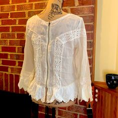 Free People Cream Blouse. Sheer With Lace. Loose And Free Flowing. Zipper Runs From Top To Bottom In Back. Never Worn. Two Small Puncture Holes From Tags At Back Collar. See Photo Fitted Bohemian Blouse For Brunch, Fitted Bohemian Blouse With Lace Top, Bohemian Fitted Tops For Daywear, Fitted Peasant Blouse For Vacation, Peasant Style Fitted Blouse For Vacation, Bohemian Tops With Lace Trim For Brunch, Bohemian Cotton Blouse With Lace Top, Bohemian Peasant Lace Top, Bohemian Lace Trim Top For Brunch