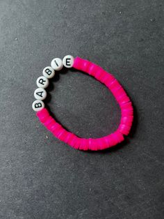 A Barbie bracelet since there is a new Barbie movie Barbie Inspired Bracelet Diy, Barbie And Ken Bracelet, Barbie Inspired Bracelet, Barbie Themed Bracelet, Barbie Charm Bracelet, Barbie Film, New Barbie