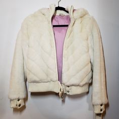 Brand New Tommy Hilfiger Faux Fur Jacket With Pink Interior. Hood Is Attached And Fits A Little Smaller Than Medium. Tommy Hilfiger Hooded Winter Outerwear, Tommy Hilfiger Winter Outerwear, Tommy Hilfiger Long Sleeve Winter Outerwear, Tommy Hilfiger Long Sleeve Outerwear For Cold Weather, Tommy Hilfiger Fall Outerwear For Cold Weather, Tommy Hilfiger Jackets, Pink Interior, Faux Fur Jacket, Fur Jacket